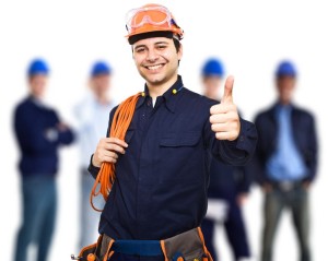 15668913 - portrait of an happy worker in front of his team